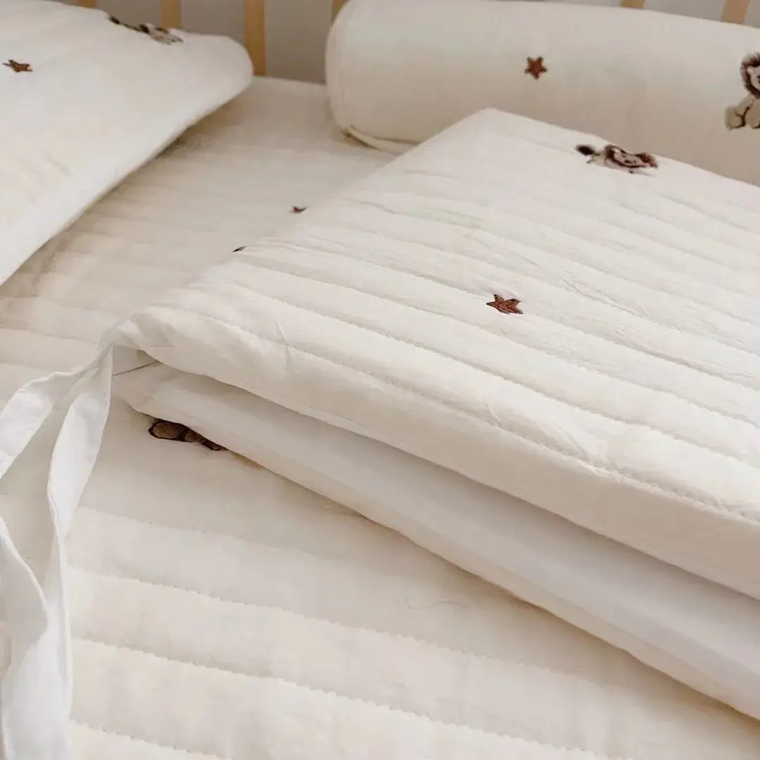 Set Cuscino Antiurto "Teddy Ricami" per culla - 4 pezzi 30x120 cm