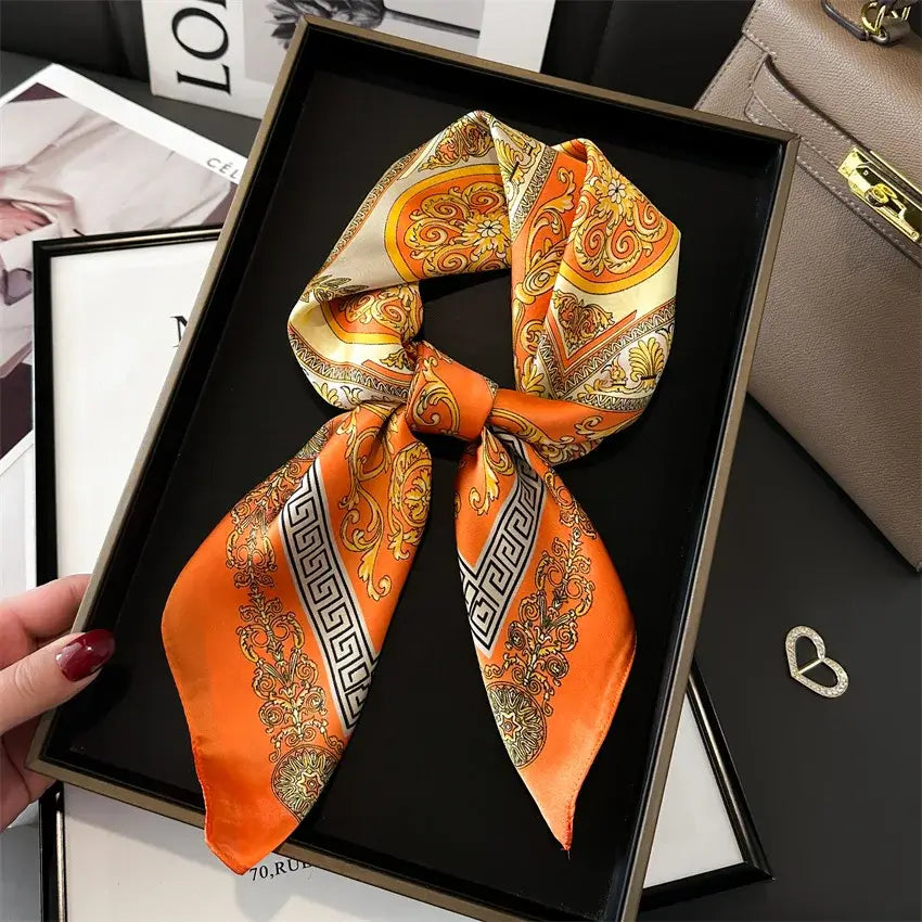 Orange Foulard di Seta "Bandana Miami" - 70x70 in elegant gift box with intricate patterns.