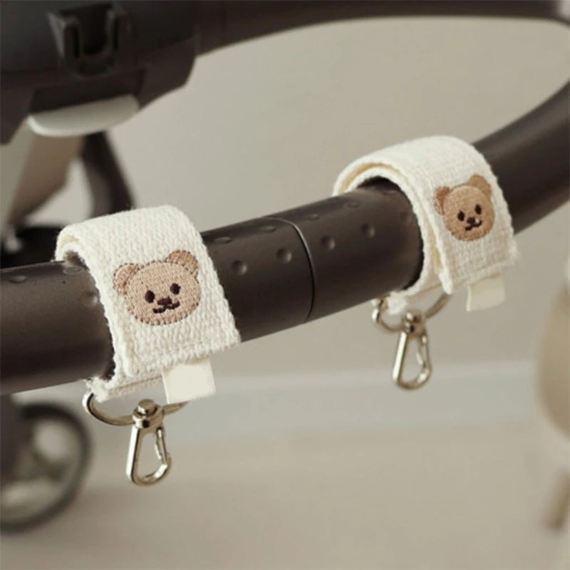 Gancio per Passeggino "Teddy Easy" - il gancio resistente per tutte le tue Borse bebè